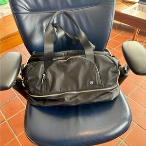 lululemon athletica Black Duffel Bag with Smooth Material and Medium Size